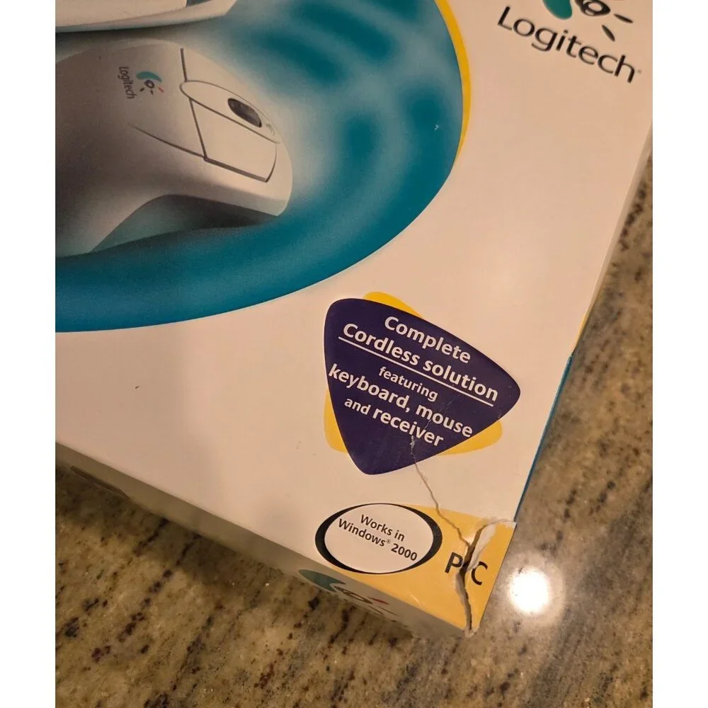 Logitech Cordless Freedom Navigator Keyboard Wheel Mouse Receiver User Guide